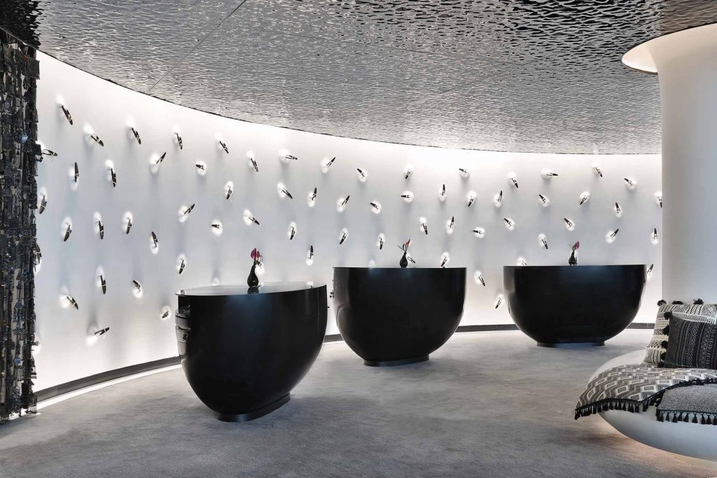 W Abu Dhabi oil drop welcome desks, jewel curtain and peg detailing