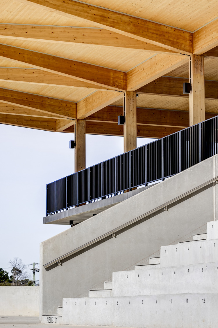 dwp | design worldwide partnership crafts exquisite sustainable design with the newly completed timber architecture of the Eric Tweedale Stadium, Granville Park, Merrylands NSW Australia. — image