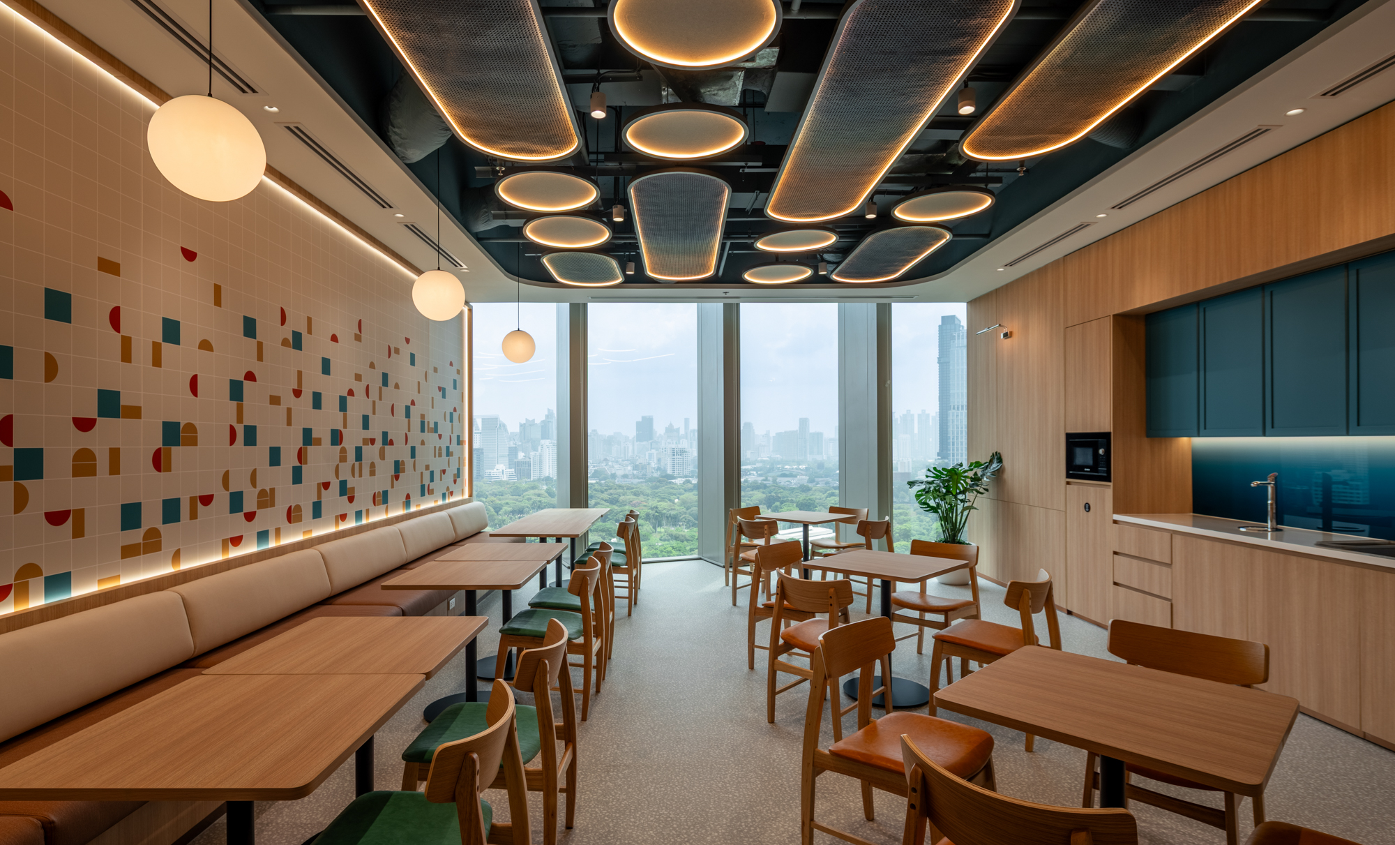 Staff pantry at Herbert Smith Freehills Kramer Bangkok office featuring Thai-inspired design and woven ceiling details