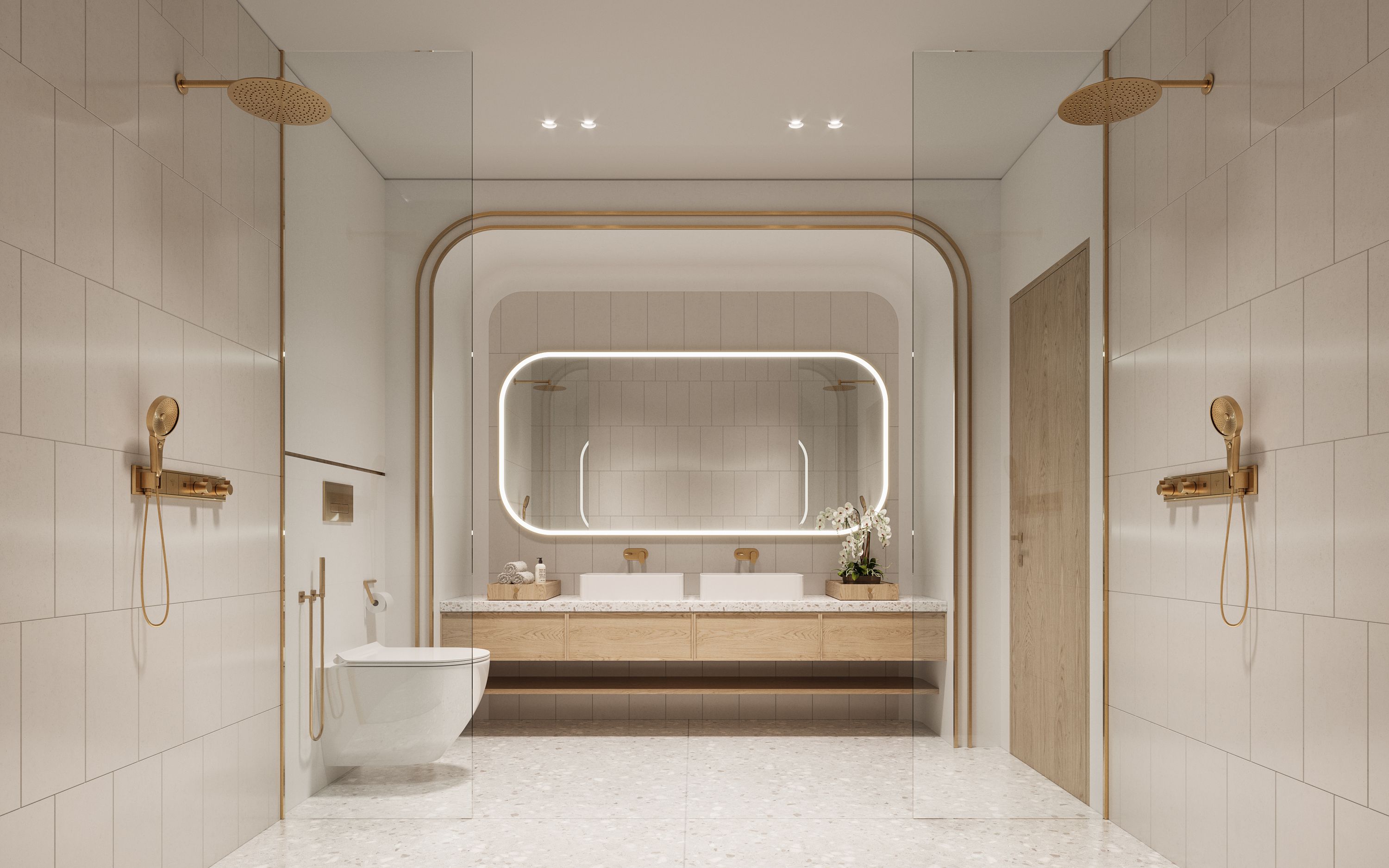 Sensia by Beyond bathroom interior with twin vanity, curved illuminated mirror, brass fittings and refined neutral finishes